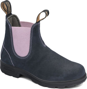 Ankle-high navy suede boot with elastic pink panel, dual pull tabs, and chunky black sole.