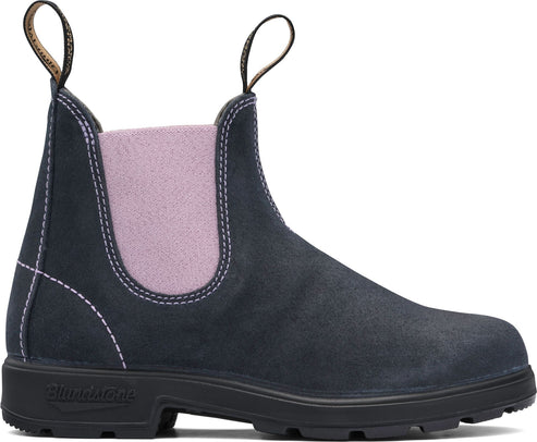 Dark blue suede Chelsea boot with lavender elastic siding and pull tabs.