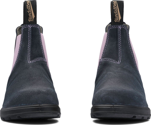 Navy suede ankle boots with pink elastic side panels and black soles, front view.