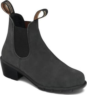 Black Chelsea boot with elastic side panels and block heel.