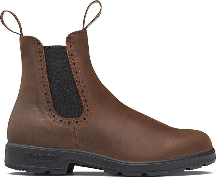 Brown leather boot with black sole and elastic side panel.