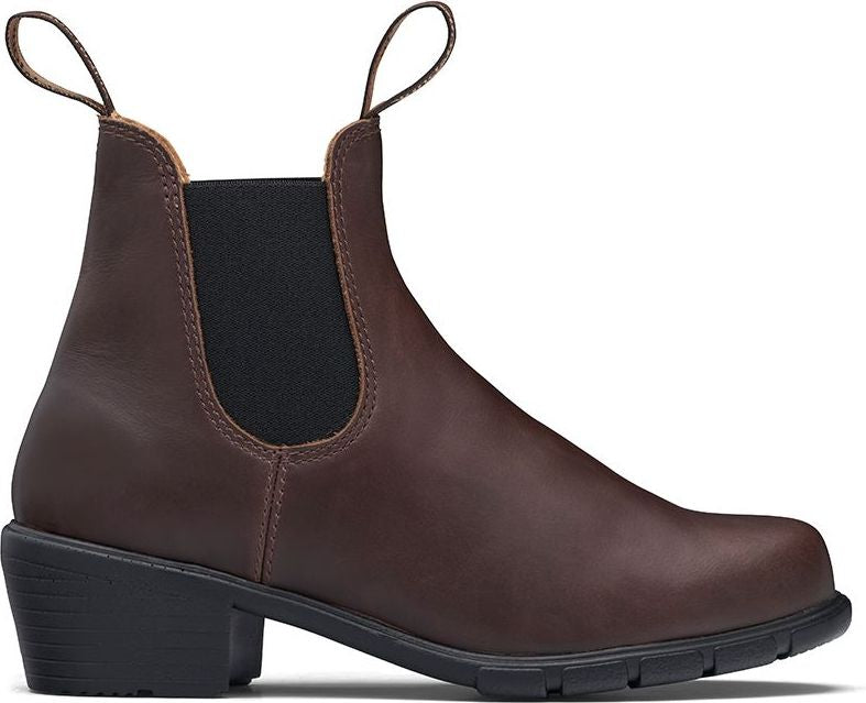 A brown leather ankle boot with a black heel and elastic panel.