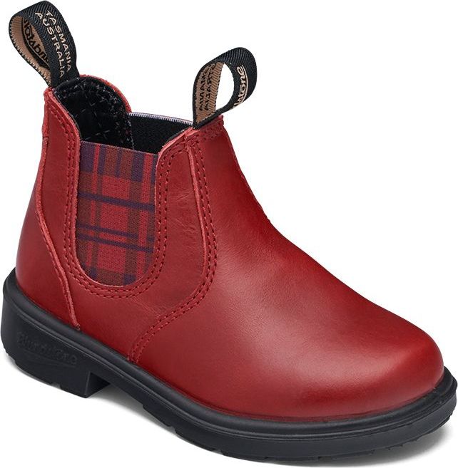 Red children's boot with elastic side panel with a tartan pattern.