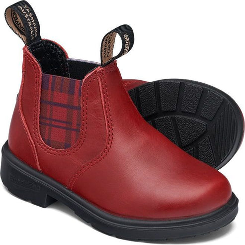 Red ankle boot with black sole, plaid elastic side panels, and a pull tab
