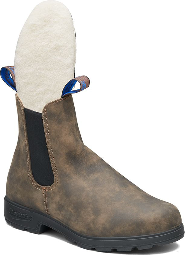 Brown leather Chelsea boot with blue pull tabs and visible beige wool insole.