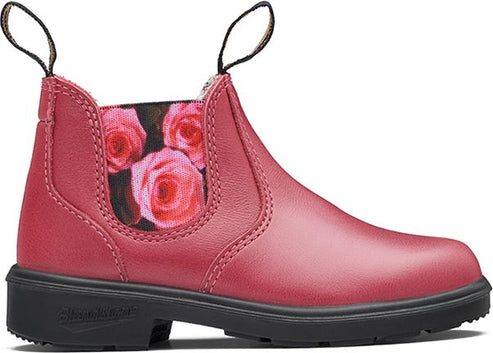 Pink leather boot with a floral print interior and black sole.