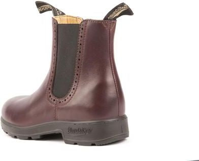 Low cut brown leather boot with elastic siding and a loop on the heel