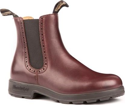 Side view of a dark red/brown Chelsea boot with decorative perforations along the elastic sides, featuring black elastic side panels, pull tabs on front and back, and a black sole.