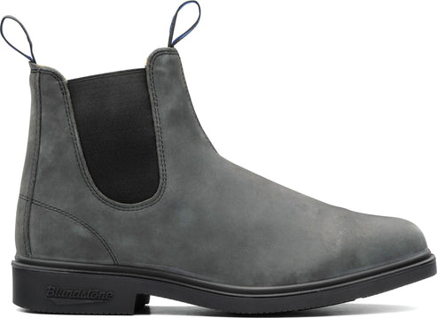 Gray Chelsea boot with a black sole and black elastic side panels.