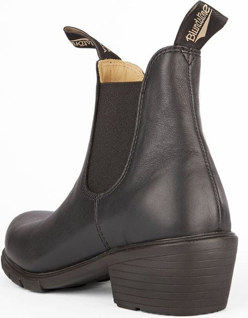 Ankle-high black leather boot with elastic side panel and pull tabs.