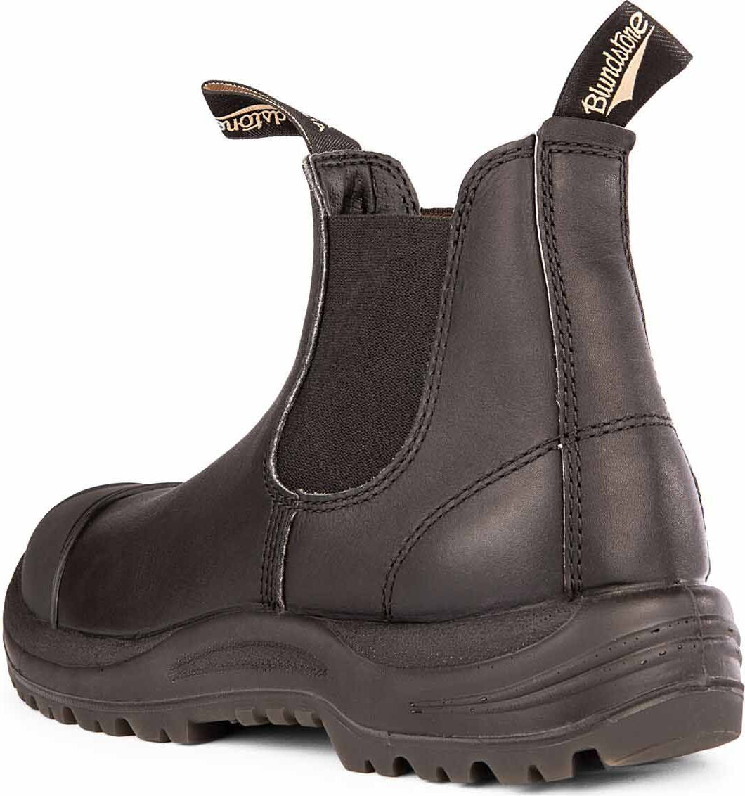 Back view of a black leather work boot with elastic side panels, thick lugged sole, and dual pull tabs.