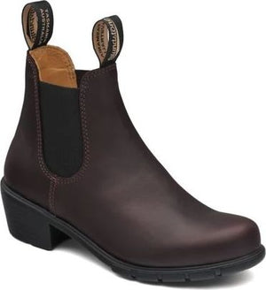 A brown leather ankle boot with a black elastic side panel and a block heel.