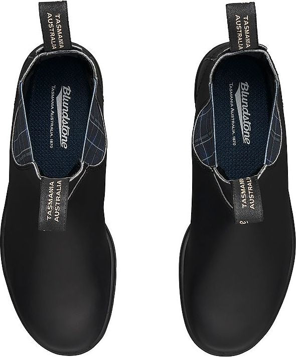 Top-down view of two black slip-on boots, showing elastic side panels with a plaid pattern, and labeled pull tabs.