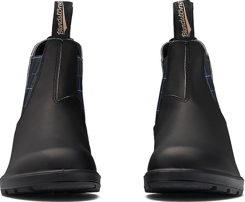 Front view of two black pull-on boots with black pull tabs and blue plaid elastic inserts.
