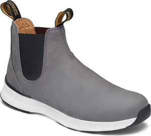 Gray ankle boot with black elastic side panels and a white sole.
