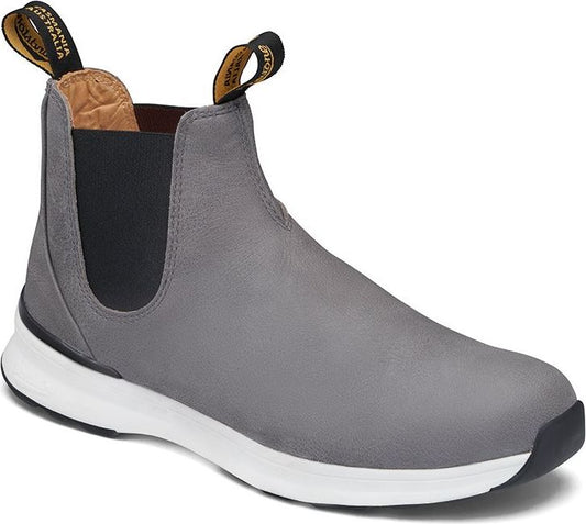 Gray ankle boot with black elastic side panels and a white sole.