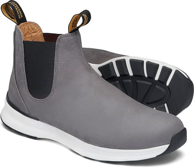 Gray Chelsea-style boot with black elastic side panels and a white sole.