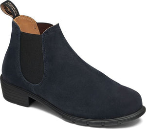 Dark blue suede ankle boot with black elastic side panels and a low stacked heel.