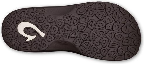 Dark brown sandal sole with triangular and circular tread and a white hook-shaped emblem.