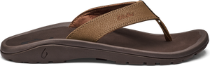 A brown leather sandal with a rubber sole.