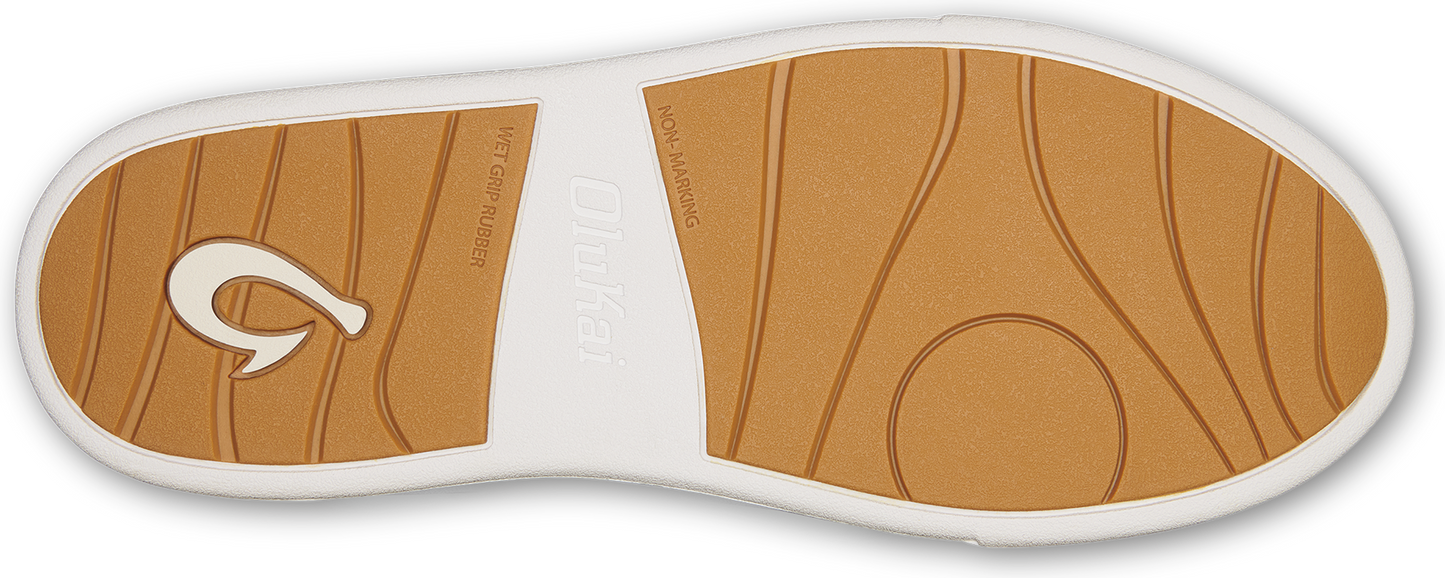 Tan and white shoe sole with a hook logo.