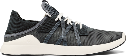 A gray athletic shoe with white laces and a white sole.
