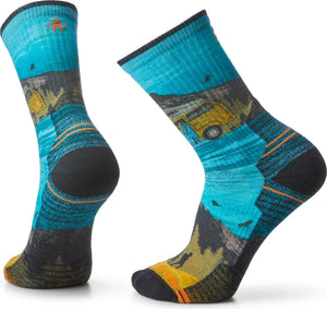 Pair of crew socks with a blue and green scenic design featuring a yellow van and tent.