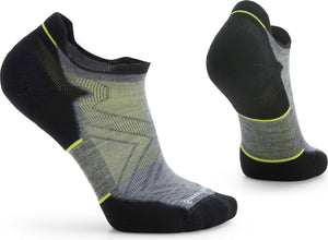 Two low-rise athletic socks, one angled showing the side and one standing on its heel, are black on the heel and toe, grey on the instep with a lime green stripe at the heel and the toe.