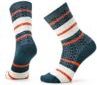 Two dark blue socks with white and orange stripes.