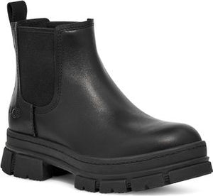 A black, leather, ankle-high Chelsea boot with a thick, treaded platform sole.