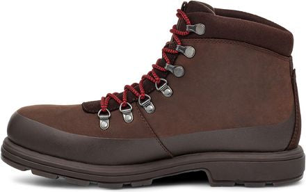 Side-view of a dark brown leather hiking boot with red laces.