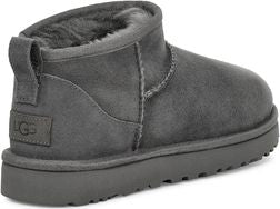 Gray suede ankle boot with loop pull.