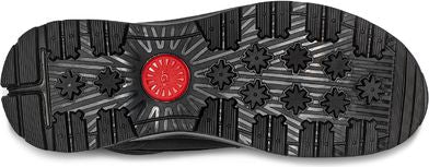 Bottom view of a shoe sole in black, featuring patterned treads and a red circular detail.