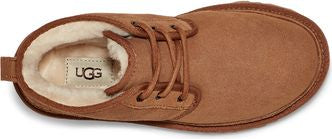 A tan-colored, lace-up UGG boot with a sheepskin lining, seen from above.