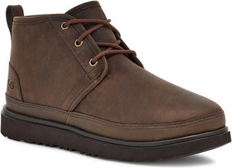Brown ankle-high lace-up leather boot with a dark sole.