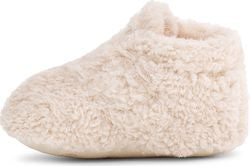 Cream-colored, fluffy slipper.