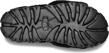 The sole of a shoe with a thick tread and the word "UGG" in the center.