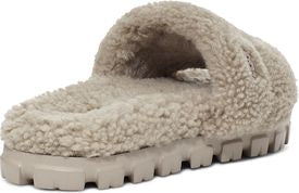 Beige, furry slipper with chunky sole.