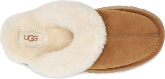 Tan and white UGG slipper.