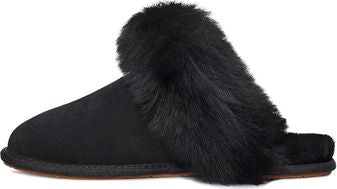 Black furry slipper, side view.