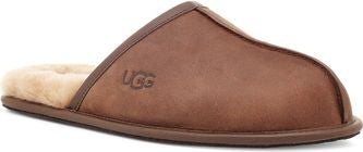 A brown UGG slipper with a sheepskin lining.