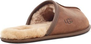 Brown leather slipper with fur lining and logo on the side.