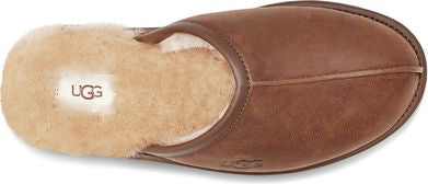 Brown UGG slipper with sheepskin lining.
