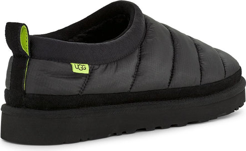 Black puffy slipper with black sole and green and yellow tag and heel pull.