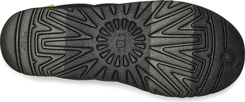 The black lug outsole has a tread pattern with UGG logo at center.